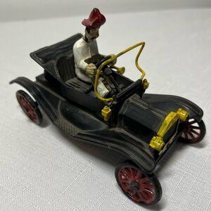 Vintage MODEL T Toy Car and driver. Red Wheels. Plastic.